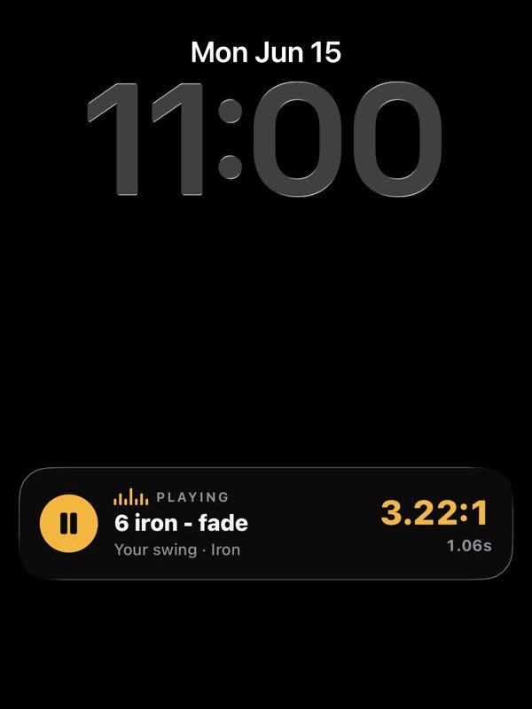 An iPhone lock screen showing the Elite Tempo Live Activity: a 6 iron fade playing back at a 3.22:1 tempo over 1.06 seconds.